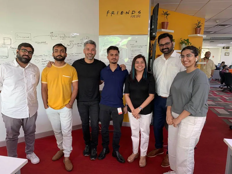 Kousik with the OLX Autos team in their office